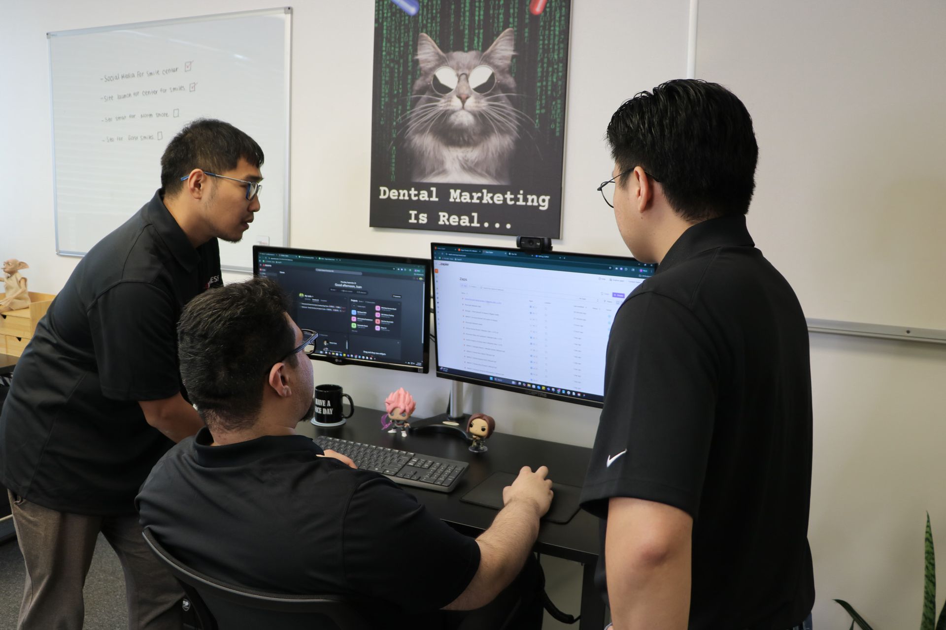 Xpress Inc team reviewing a dental website build
